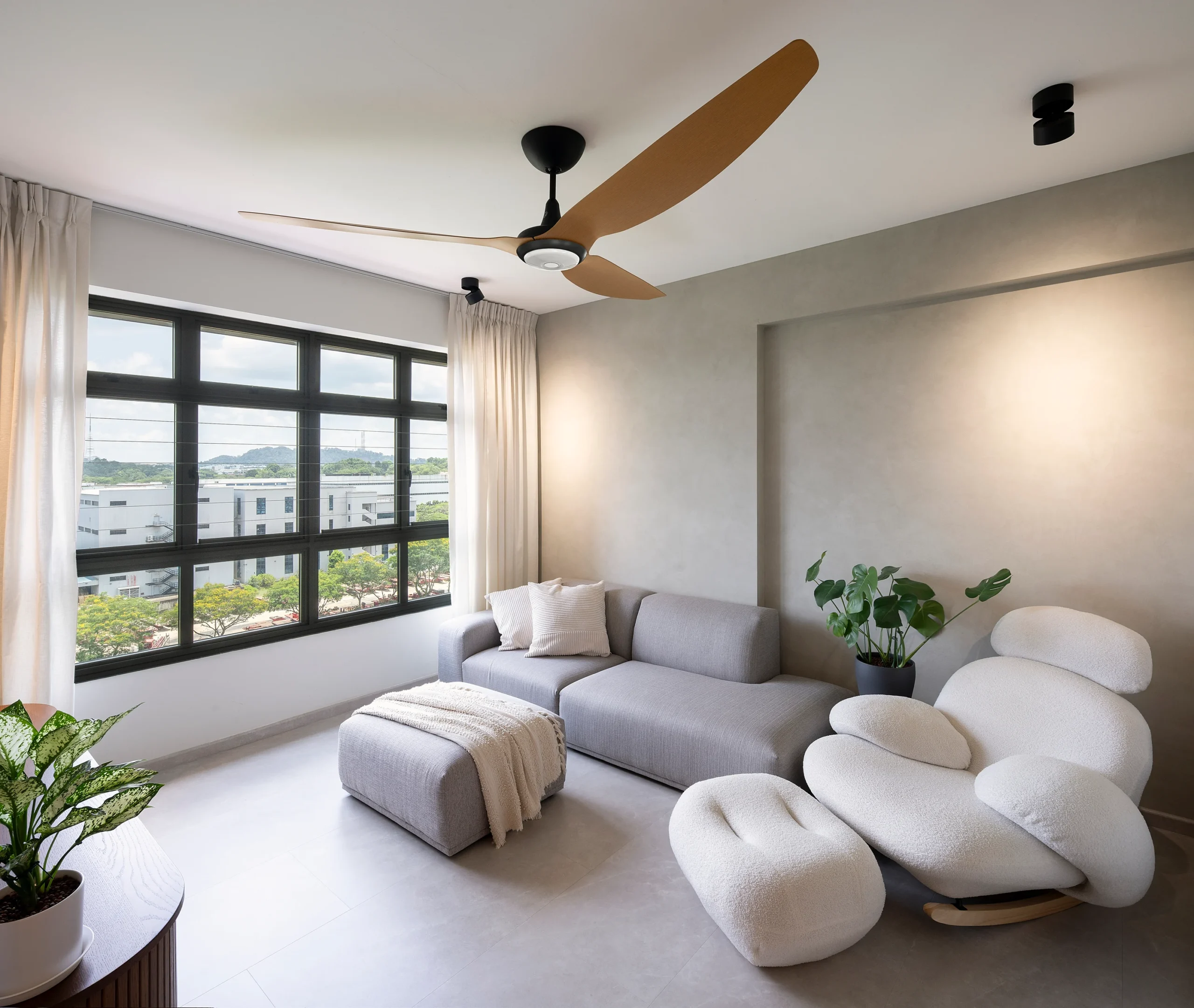 Living room with sofa and wooden ceiling fan