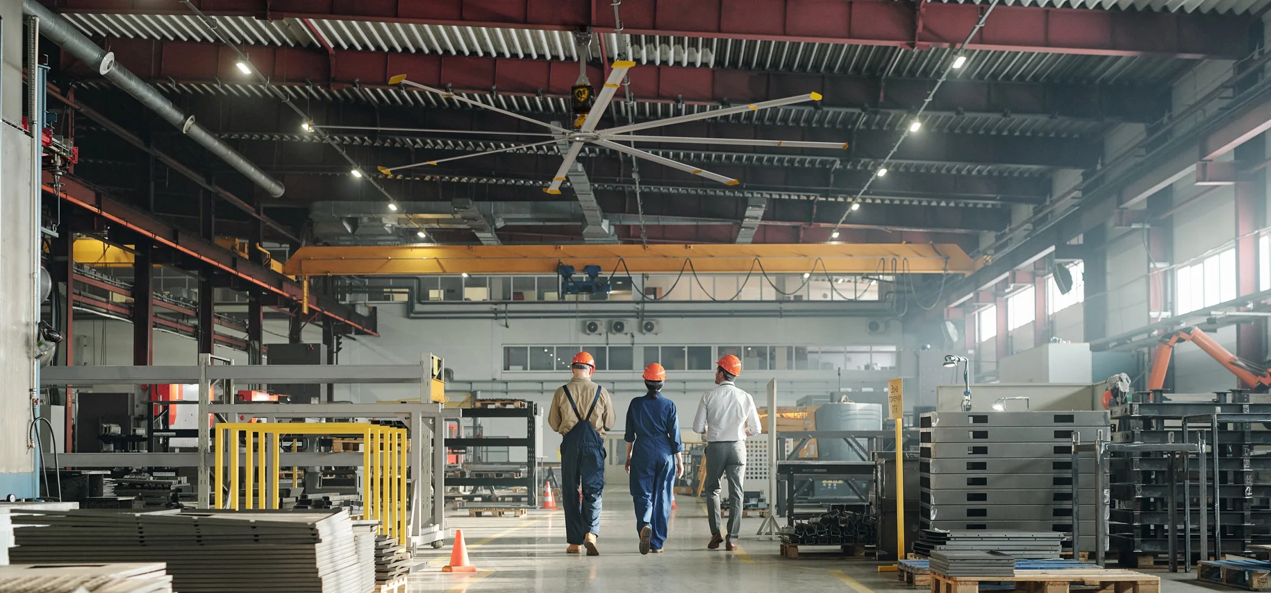 Three men exploring HVLS Fans