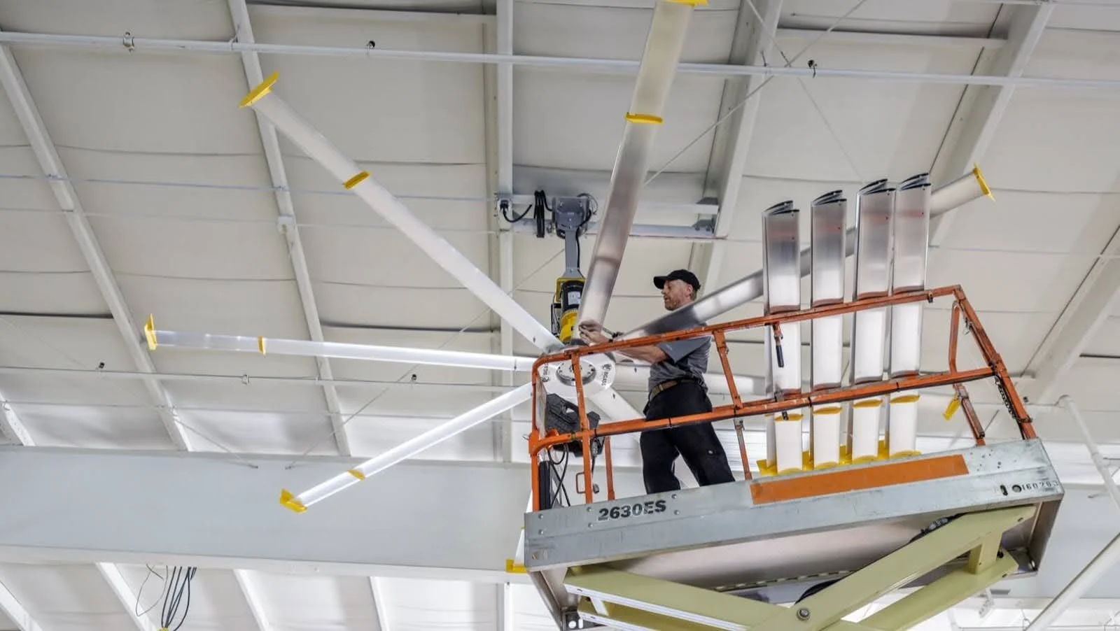unnamed-1 Technician from Big Ass Fans installing a large HVLS ceiling fan
