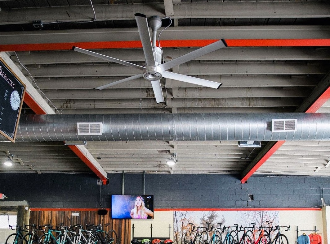 A commercial fan in a bike retail store